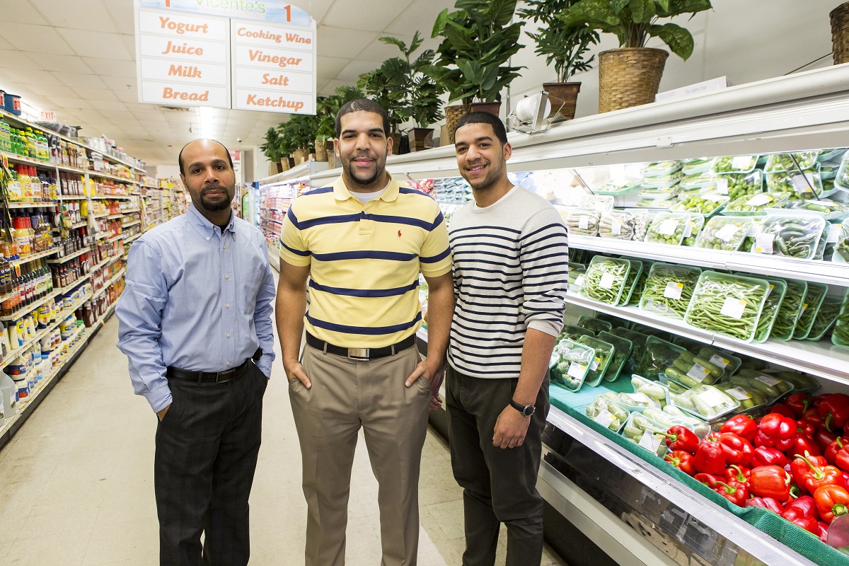Owners of Vicente's Tropical Market in their store