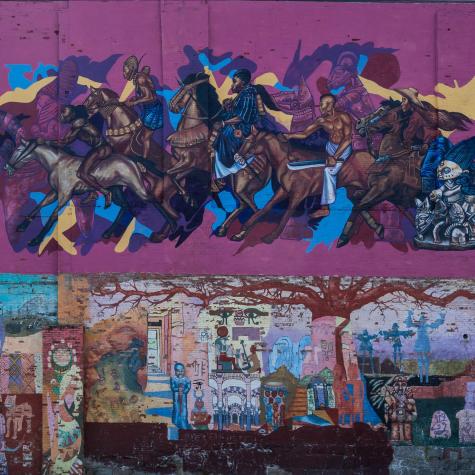 “1000 Hooves” mural painted by Stephen Hamilton with assistance from Jeff Henriquez, located in Nubian Square. 